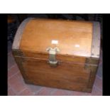A metal bound dome top trunk