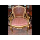 A gilt painted French armchair