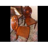 Pair of Victorian mahogany hall chairs