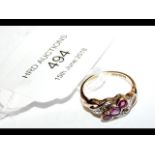 A ruby and diamond ring in 9ct gold setting