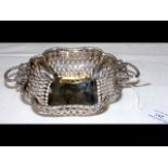 Elegant silver pierced two handled bonbon dish