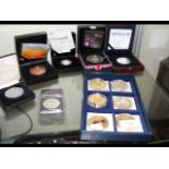 Various collectable coins, including "The UK London 2012