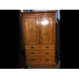 A Victorian linen press with three drawers below