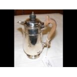 A sterling silver coffee pot - 17cm high