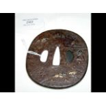 Japanese tsuba with interior scene decoration - 8c