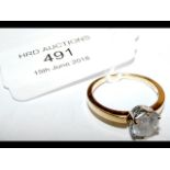 A diamond Solitaire ring in 18ct gold setting (app