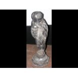 A 64cm high old lead garden ornament of cherub