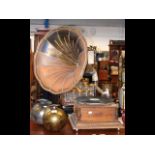 An old oak cased wind-up gramophone by Amplus