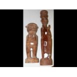 A Trobriand Islands carved wooden female figure, t