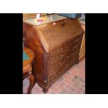 A Georgian mahogany bureau with fitted interior