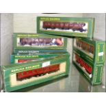 Seven boxed OO Gauge Carriages