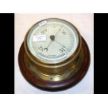 A brass cased ship's barometer/thermometer