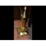 A heavy decorative 64cm high brass Corinthian lamp