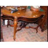 Antique rosewood centre table with shaped top and