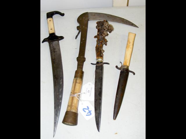 Middle Eastern dagger, together with three others