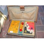 Early Mah-Jong set with book in leather case