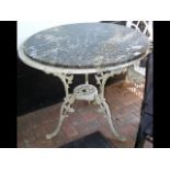 Decorative metal circular garden table with marble