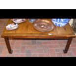 Rosewood and cross banded coffee table