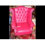 The matching wing easy chair with button back