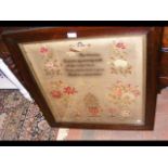 A 19th century sampler in rosewood frame - dated 1