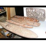 Selection of carved wooden Gope boards from the