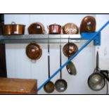 Selection of old copper saucepans, etc.