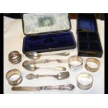 Silver napkin rings, teaspoons, etc.