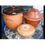 Terracotta bread bin and two others