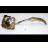 A continental white metal engraved serving ladle