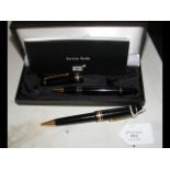 A Montblanc propelling pencil and pen set in prese