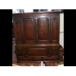 Period oak panelled cupboard with three drawers be