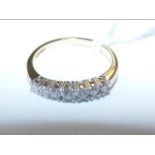 A 9ct gold diamond half hoop eternity ring