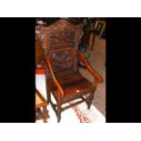 A Victorian carved Wainscot chair