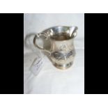 Silver cream jug with repousse decoration - 10cm h