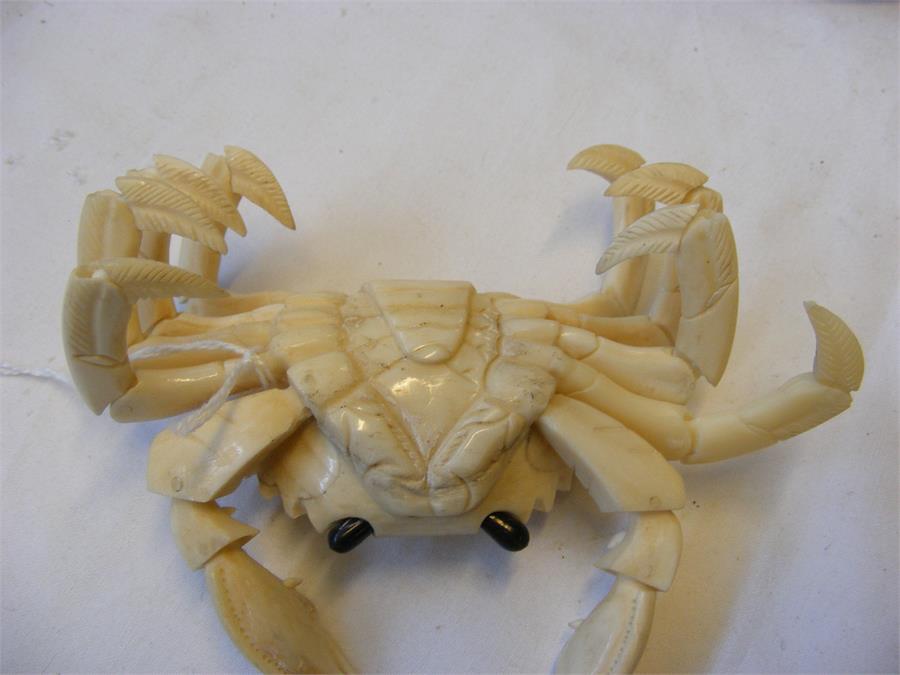 A carved oriental ivory articulated crab on wooden - Image 5 of 8