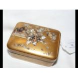 A late 19th century Japanese gold lacquer box, the