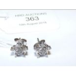 A pair of 9ct gold diamond cluster stud earrings