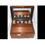 A Victorian walnut travelling box with fitted inte