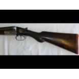 An antique 12 bore shotgun by W W Greener - with e