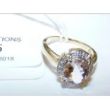 A 9ct gold morganite diamond cluster ring