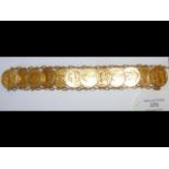 A 12 gold sovereign coin bracelet - ranging in dat