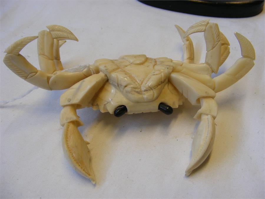 A carved oriental ivory articulated crab on wooden - Image 3 of 8