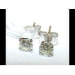 A pair of 18ct gold diamond stud earrings - 1.0ct