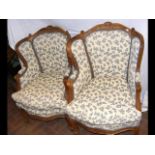 A pair of attractive French armchairs upholstered