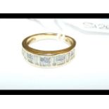 A multi-stone diamond ring in gold setting