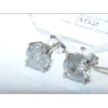 A pair of diamond stud earrings - 3.5ct total - in