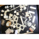 Selection of small ivory collectables, together wi