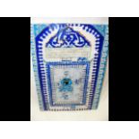 A large Iznik tile, possibly 17th century, with a