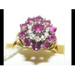 A ruby and diamond ring in 18ct gold setting
