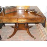 A 19th century rosewood sofa table with brass inla